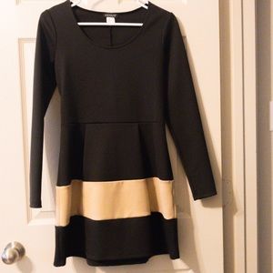 Fun and Flirty Black and Tan dress.